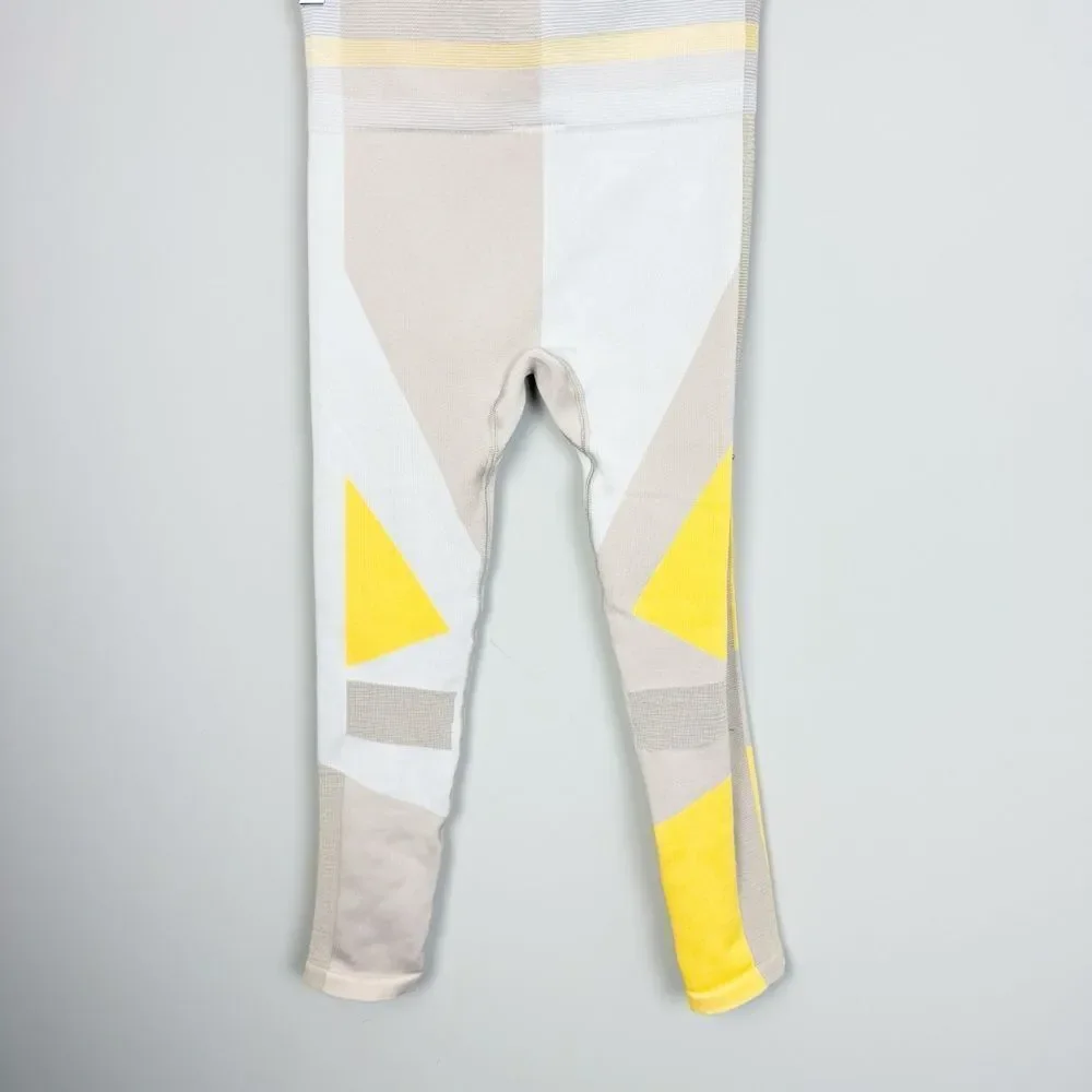 NIKE | Dri Fit Sculpt Icon Clash Cropped Leggings Yellow Gray Tan Women’s Size M
